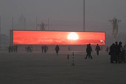 Smog-hit Beijing shows sunsets on a giant TV to remind people what the sun looks like