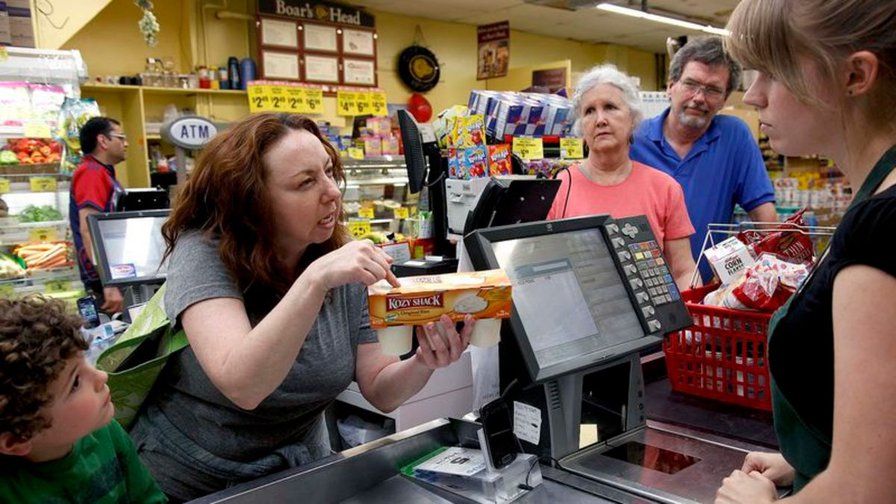 Middle-Aged Woman Angrily Demanding Price Check On Rice Pudding Was Once Carefree Youth, Onlookers Speculate | The Onion - America's Finest News Source