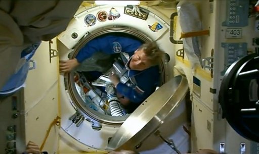 Russian cosmonaut back after record 879 days in space