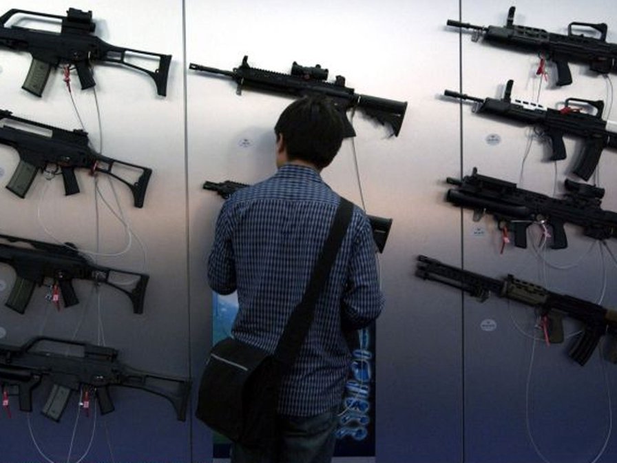 Protesters who blockaded London arms trade fair acquitted after judge sees evidence of illegal weapons on sale